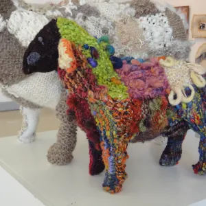 Dana Biddle — Little Sheep. Wire armature covered with knitted merino wool. 45cm x 35cm x 18cm. Artist's collection.