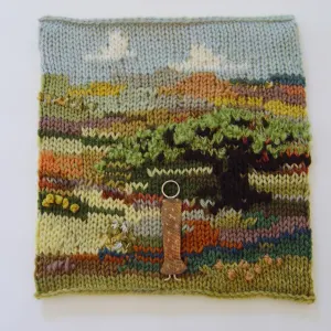 Dana Biddle — Under African Skies. Free form knitting in merino wool, with a hand made figure of copper and wire. 25cm x 25cm. Artist's collection.